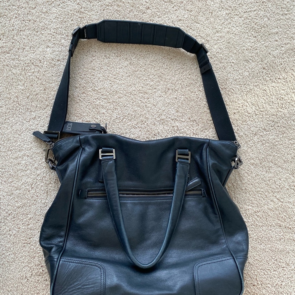 TUMI black leather bag